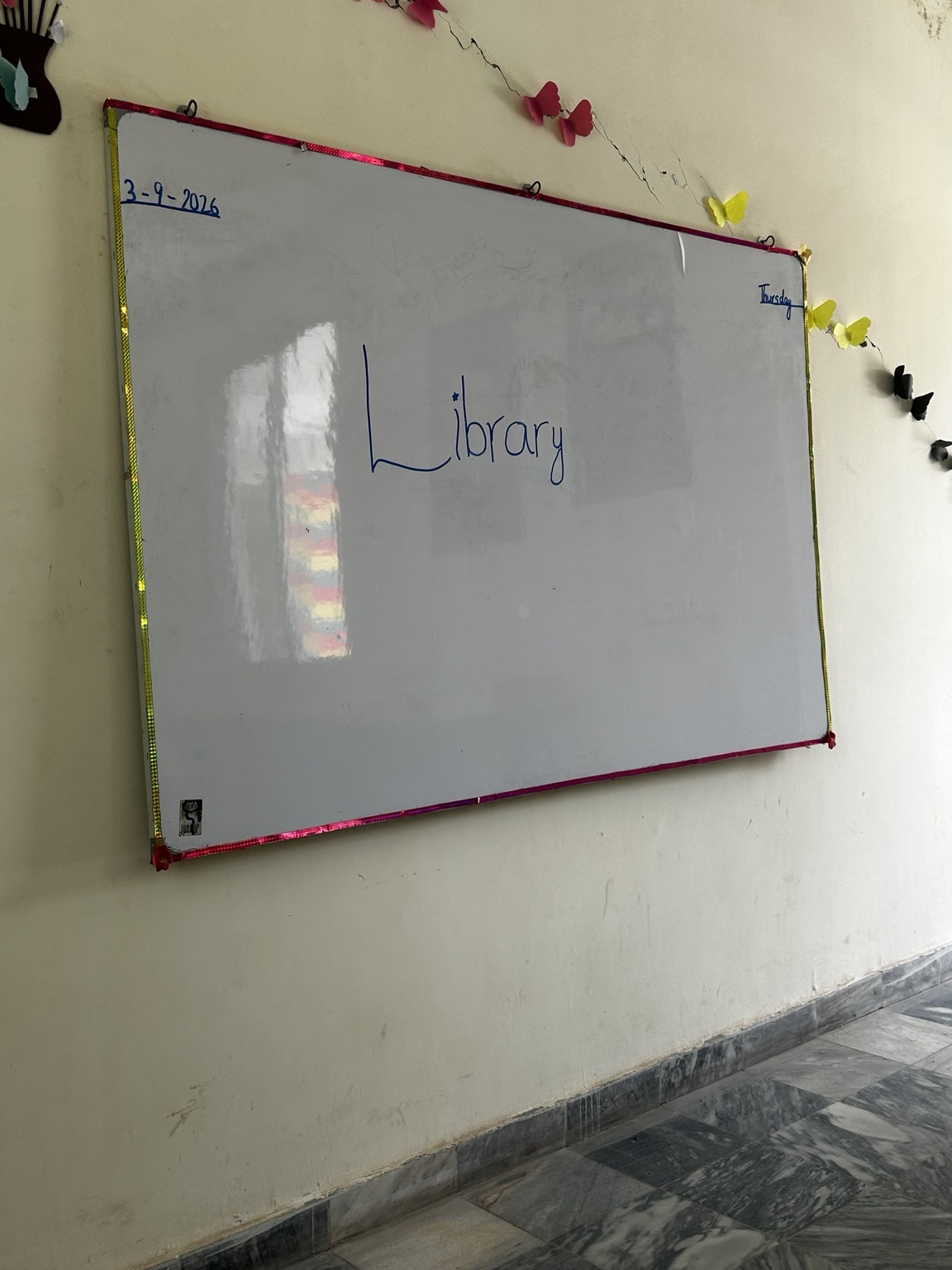 Students enjoying books together in a classroom